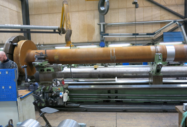 Raw material with certificate in lathe for urgent new manufacturing of shaft.jpg